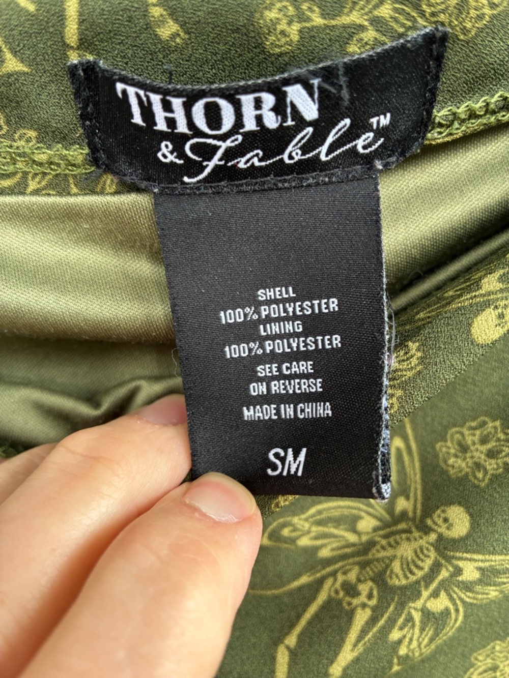 Thorn & Fable Olive Green Asymmetrical Skirt with winged skeletons & flowers - Picture 3 of 8